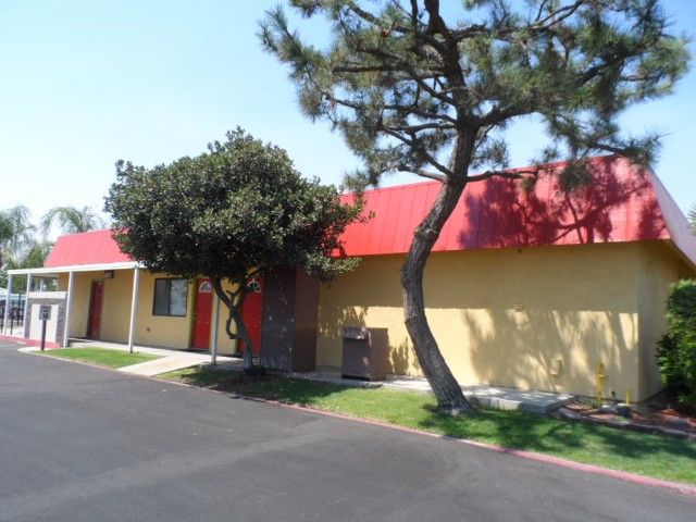 Restrooms are located on the backside of the clubouse.